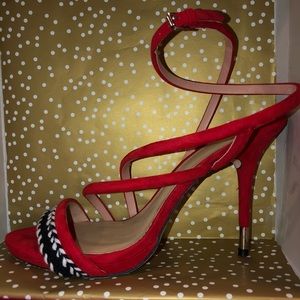 Red strappy pumps